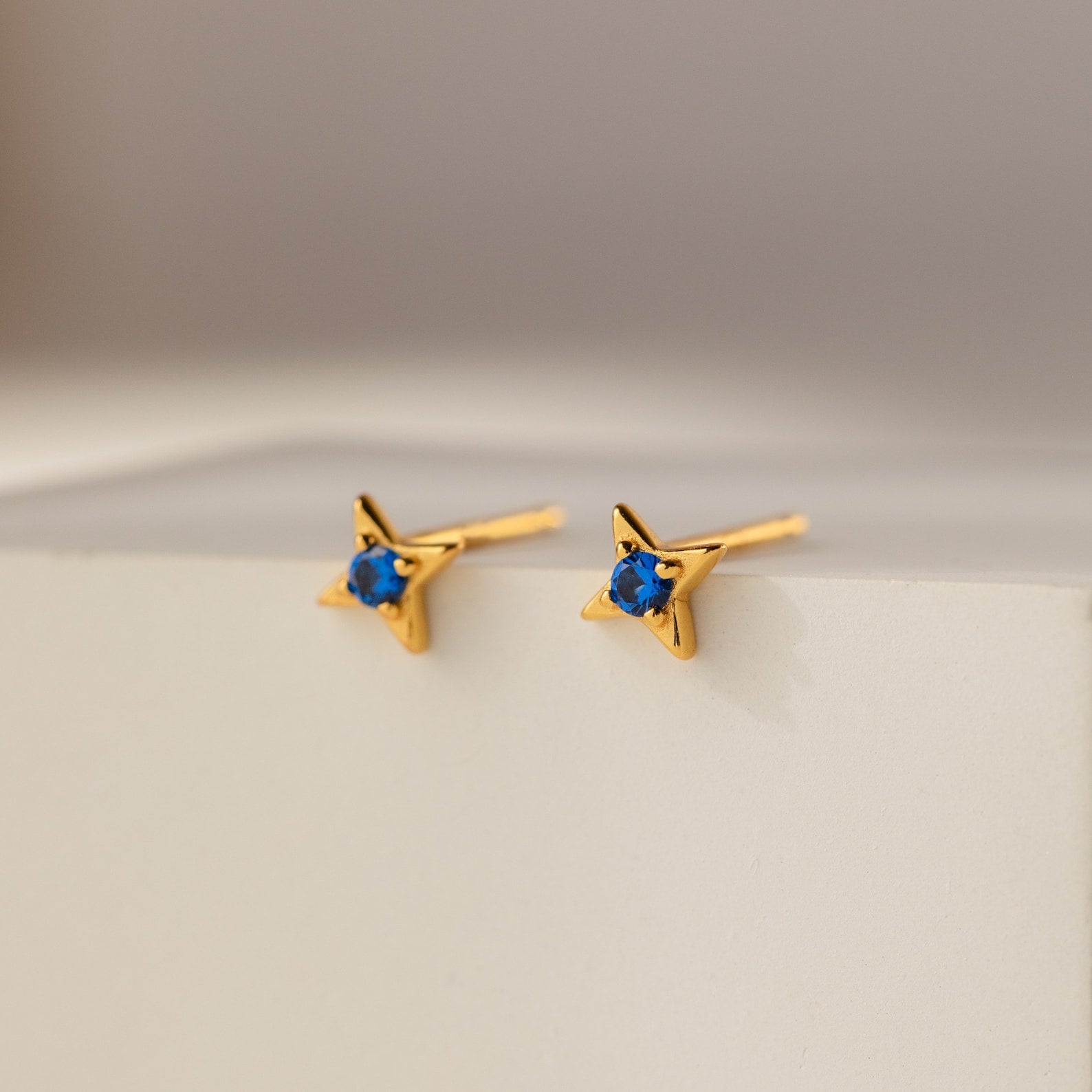 Celestial Elegance: Sapphire Star Stud Earrings
